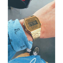 Load image into Gallery viewer, Casio Retro A168WG-9WDF Gold Dial Digital On Gold Stainless Steel Worn Shot Lady
